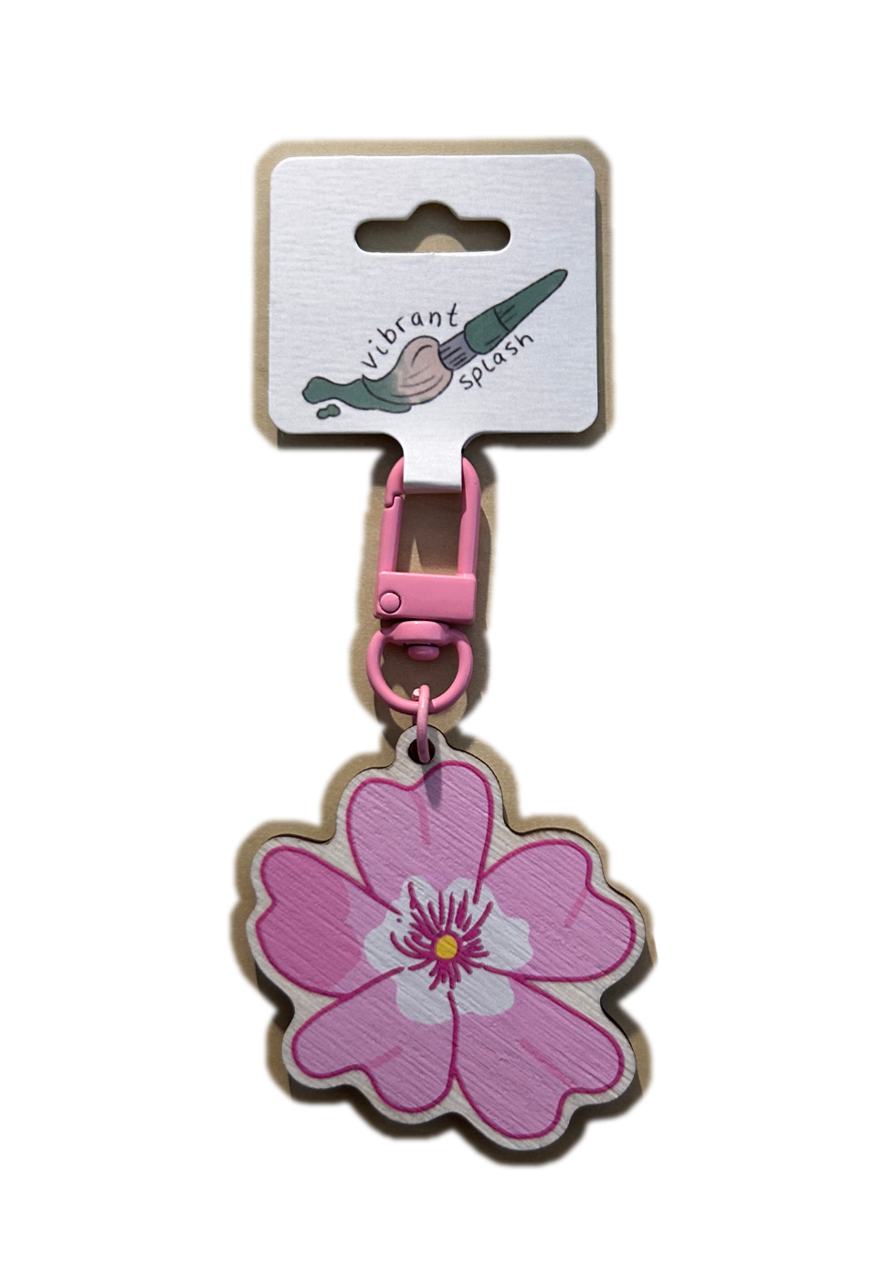 Pink blossom wooden keychain transparent PNG.